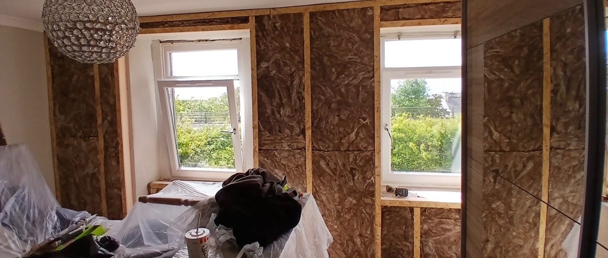 Step 2 — Insulation packed between batons